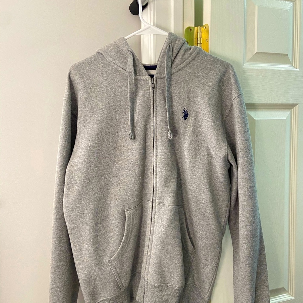 A GREY POLO HOODIE NEVER WORN, NO TAGS